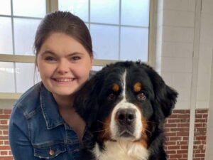 Hunter Calvelage with her Bernese Mountain Dog.